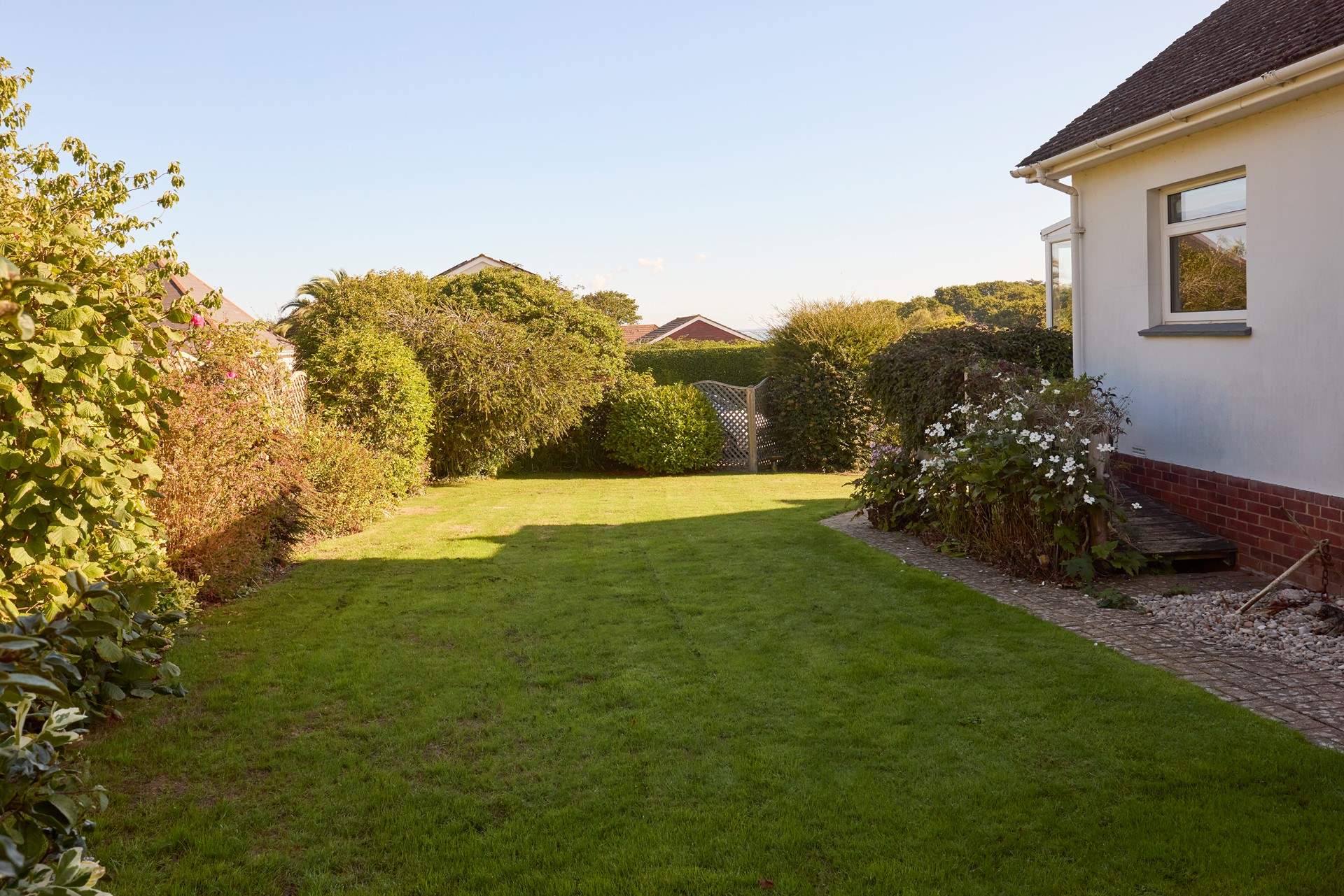 The enclosed garden is well maintained, perfect for the little ones and your four-legged friend.
