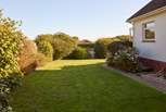 The enclosed garden is well maintained, perfect for the little ones and your four-legged friend.