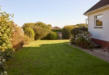 The enclosed garden is well maintained, perfect for the little ones and your four-legged friend.