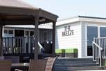 The Breeze Bar and Restaurant is located within a few minutes walk from Spring Tide.  