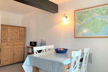 The fresh and inviting dining-area is in the main sitting-room.