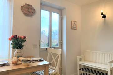 There is additional seating for two in the kitchen.