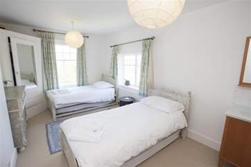 Twin bedroom on first floor with pull out trundle beds (there is minimal room between beds with all four set up - great fun for children but adults should be aware!)