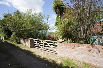 Gated parking and garden area of Swift Gottage