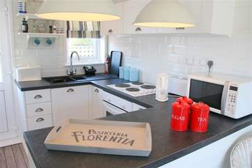 The well-equipped kitchen is a pleasant place to prepare meals.