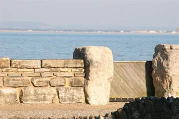The sea wall opens allowing you access to a lovely stretch of beach.