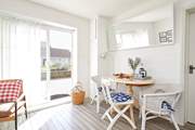 Open the patio doors and let the light flood in.