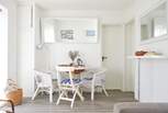 Gather round the dining table and chat about the adventures of the day. 