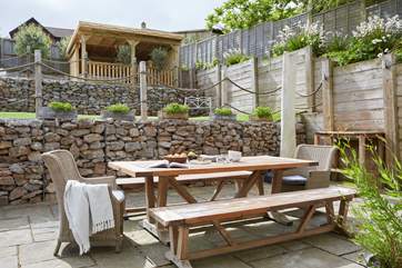 Dine under the island's sun on the first level of the outside area.