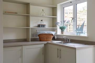 The bright utility room on the ground floor.