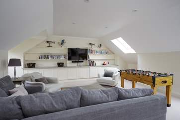 The second floor family room is the perfect room for the younger ones to enjoy.
