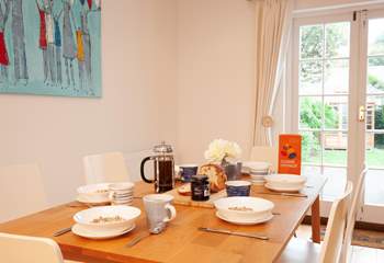 Over breakfast, enjoy the view out to the leafy enclosed garden.