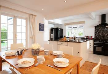 There is ample bright, inviting space for cooking, dining and relaxing.