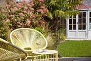 The enclosed garden has several areas to sit and enjoy your surroundings.