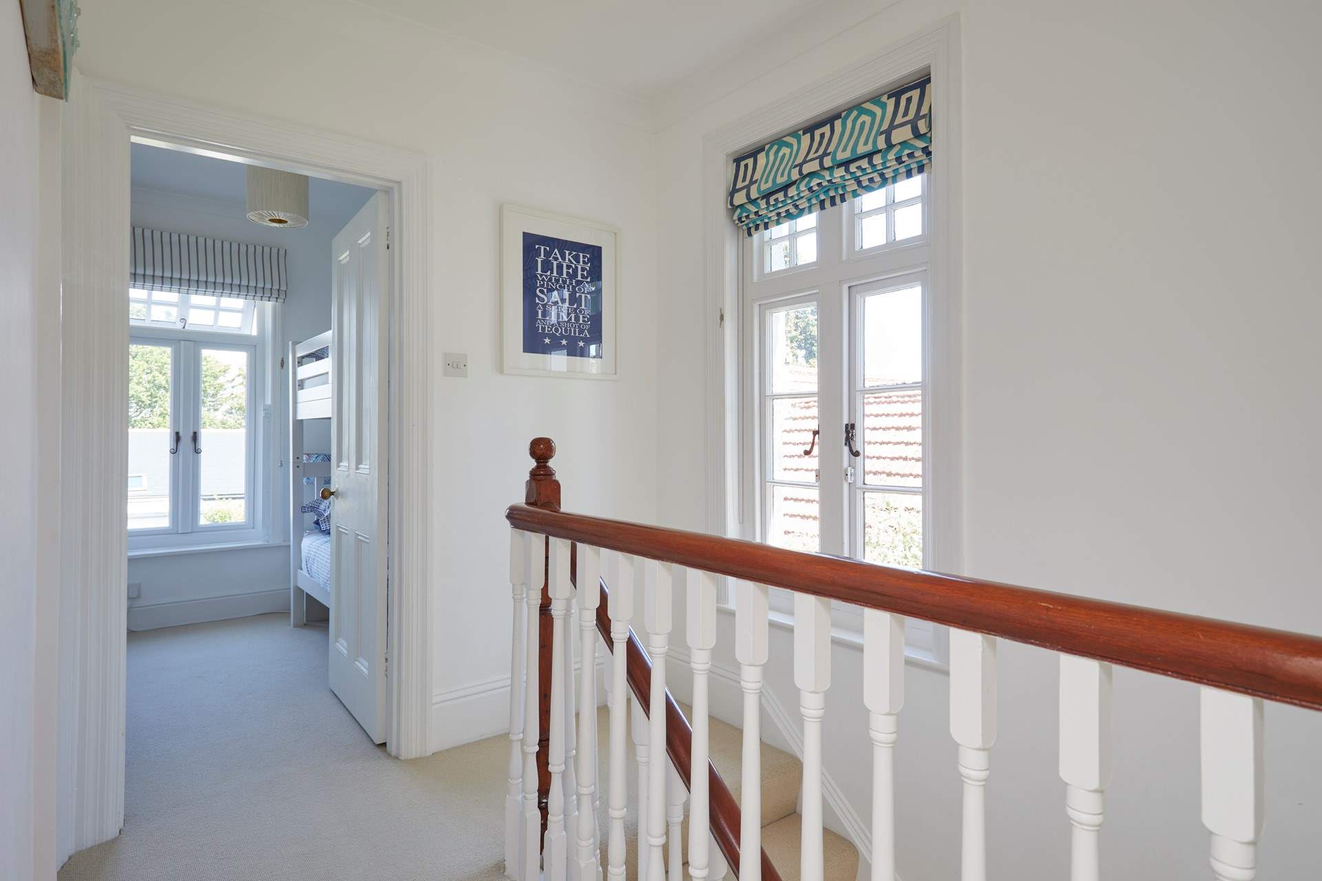 The first floor landing is a bright and airy space.
