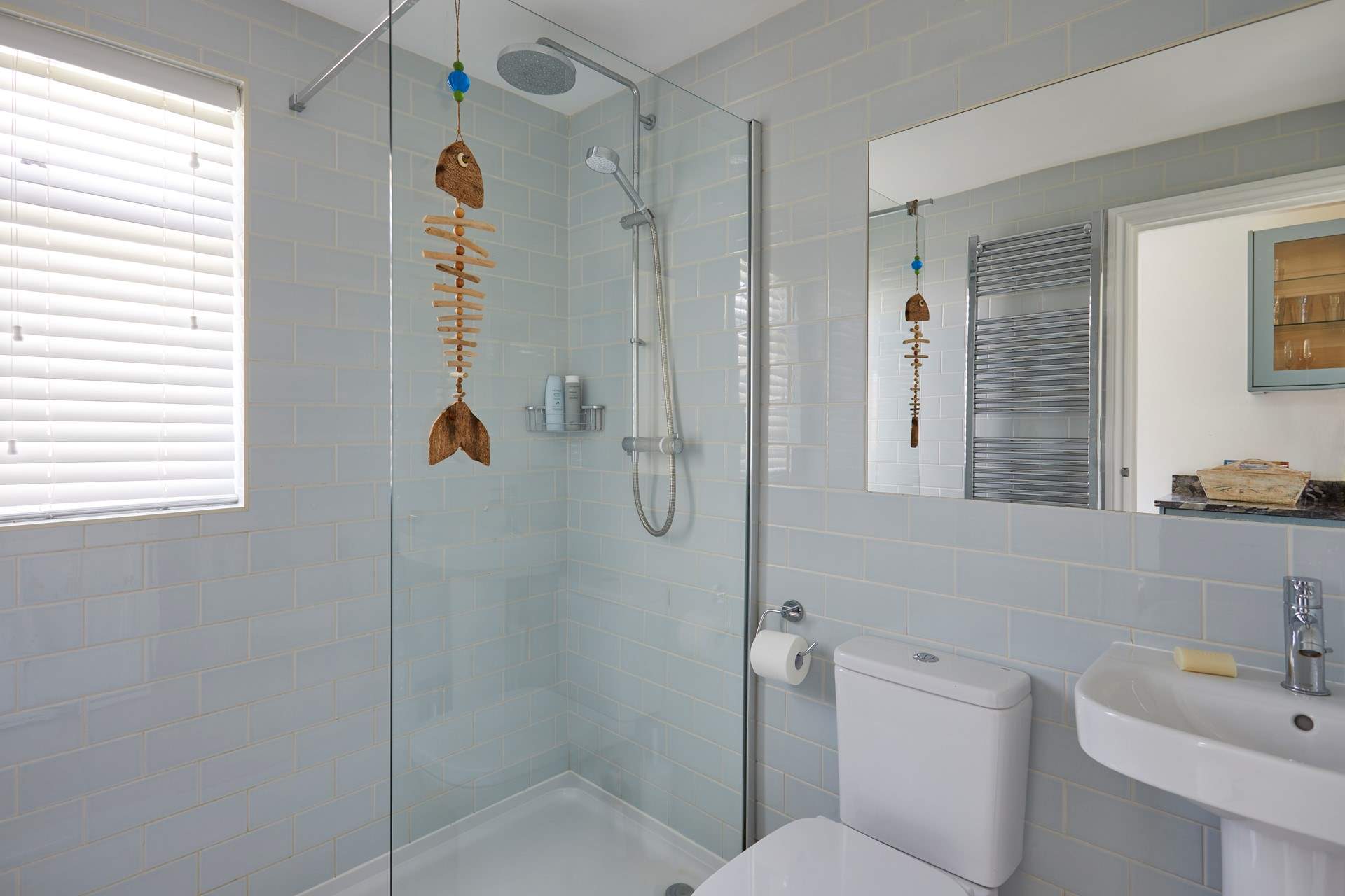 There is a contemporary shower-room located on the ground floor.