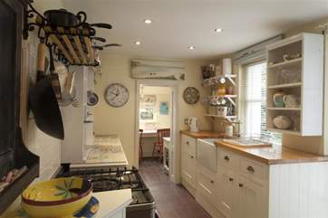 The modern kitchen comes fully equipped along with a Belfast sink.