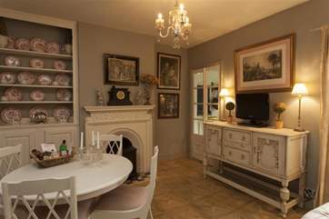 The spacious dining room seats four comfortably.