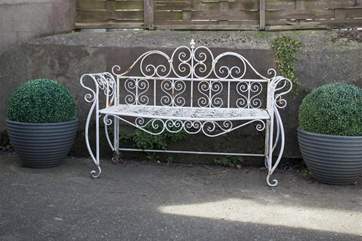 More charming space in the lovely enclosed garden.