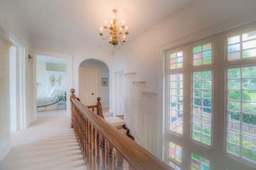 The stained glass windows are a lovely feature of the staircase.