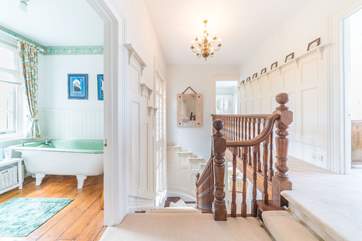 The dog-leg staircase leading on to the first floor landing.