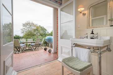 The patio off the downstairs en suite is perfect for sunny days and can be accessed through the hallway.