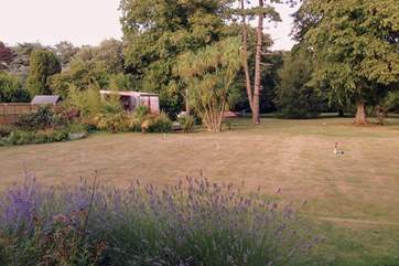 Stunning garden with patio area, a game of rounders perhaps?
