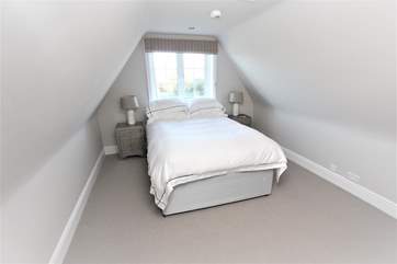 Another double bedroom on the second floor.
