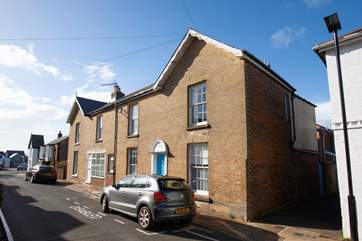 Yardley is the pretty cottage with the sky-blue door in the heart of Seaview.