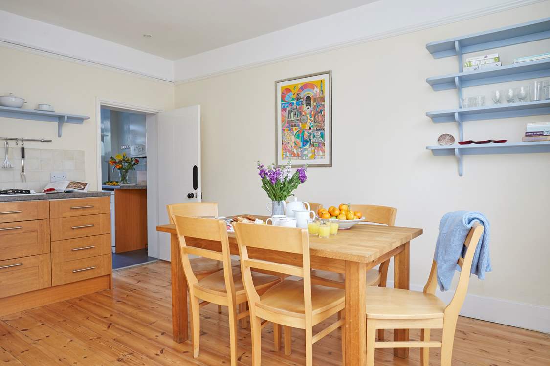 The welcoming dining table in the kitchen for all your scrumptious family meals.
