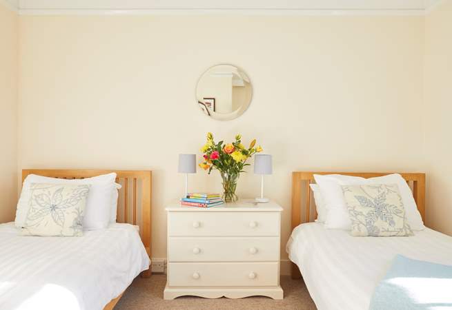 The second bedroom boasts twin beds. Perfect for both children and adults.