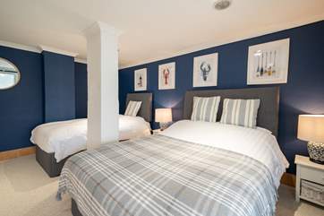 Bedroom four on the ground floor offers twin beds.