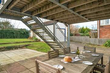Enjoy lunch in the garden before heading back to the beach.