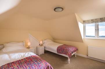 Bedroom 3 has two single beds and a built- in wardrobe and is a great room for children.