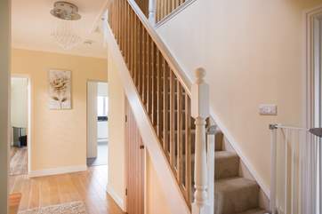 Stairs rising to bedrooms 3 and 4.