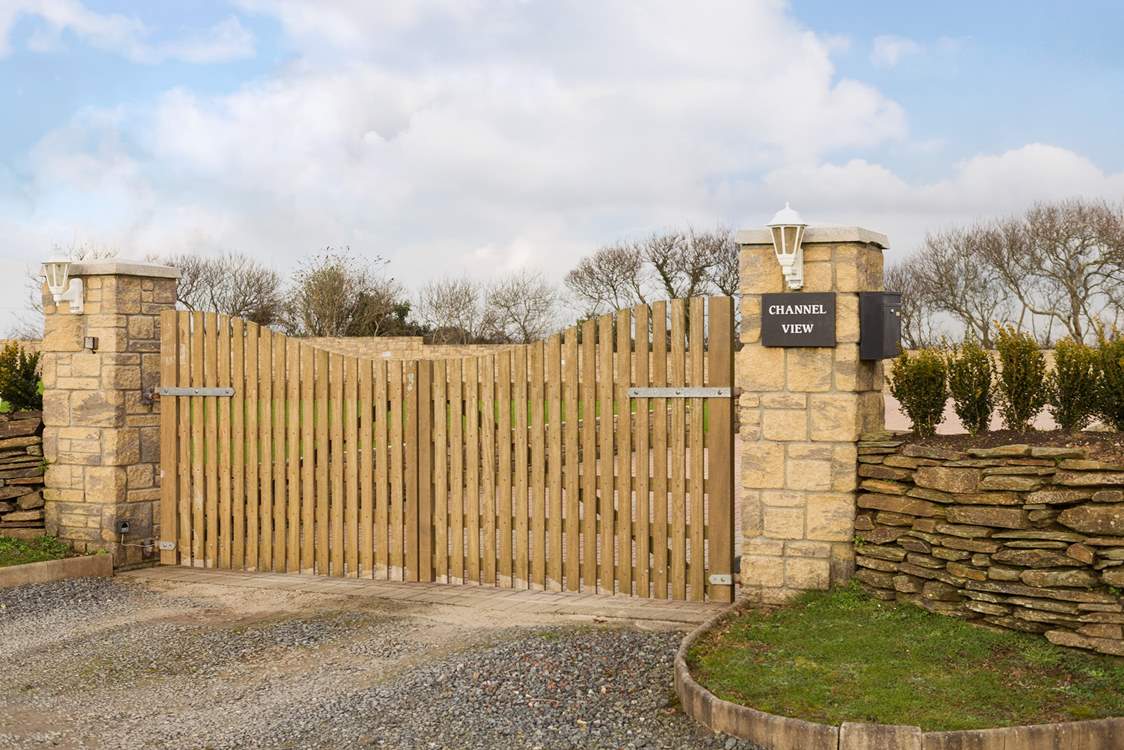 The impressive entrance to Channel View has a coded gate.
