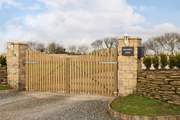 The impressive entrance to Channel View has a coded gate.