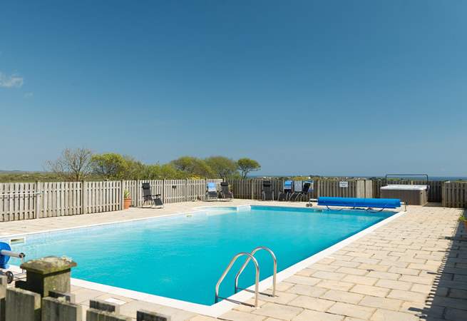 The fantastic heated swimming pool, big enough to do a few lengths before breakfast or just for fun (available Easter to the end of September)