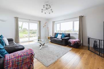 The large sitting room has plenty of space for everyone, perhaps play a game of charades?