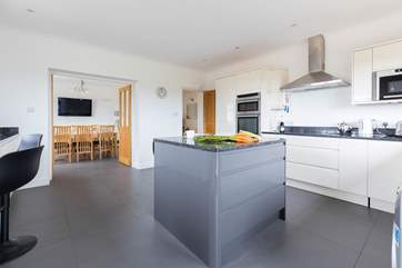 Double doors lead from the kitchen to the dining room.