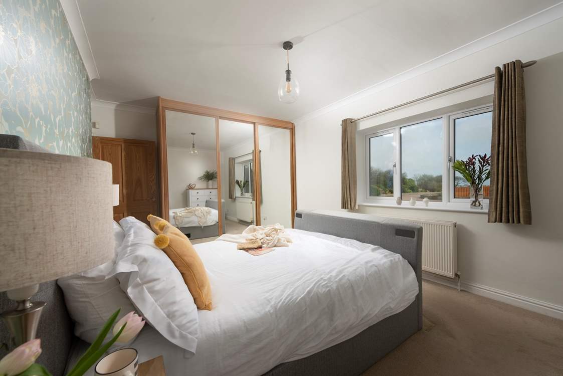 Bedroom 2 with ample hanging space.
