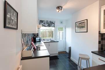 The kitchen is modern and fully equipped with everything you will need.