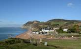 The beach at Seatown, with the award-winning Anchor Inn. - Thumbnail Image