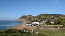 The beach at Seatown, with the award-winning Anchor Inn.