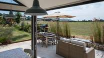 The bi-fold and tri-fold doors open to create a wonderful space.