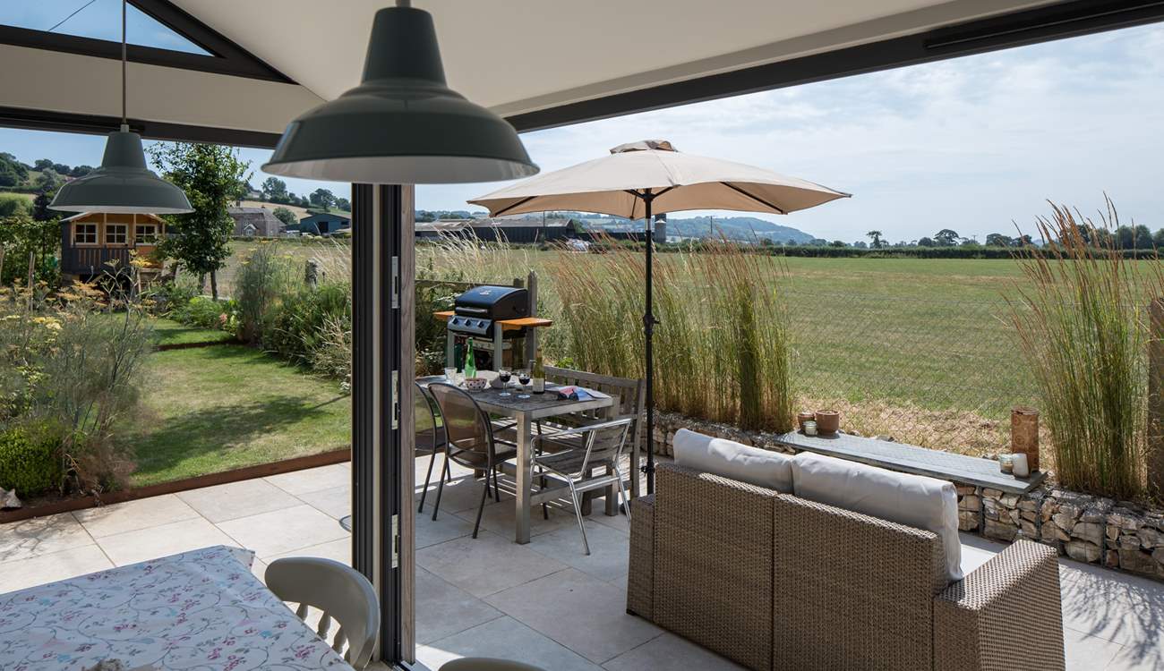 The bi-fold and tri-fold doors open to create a wonderful space.