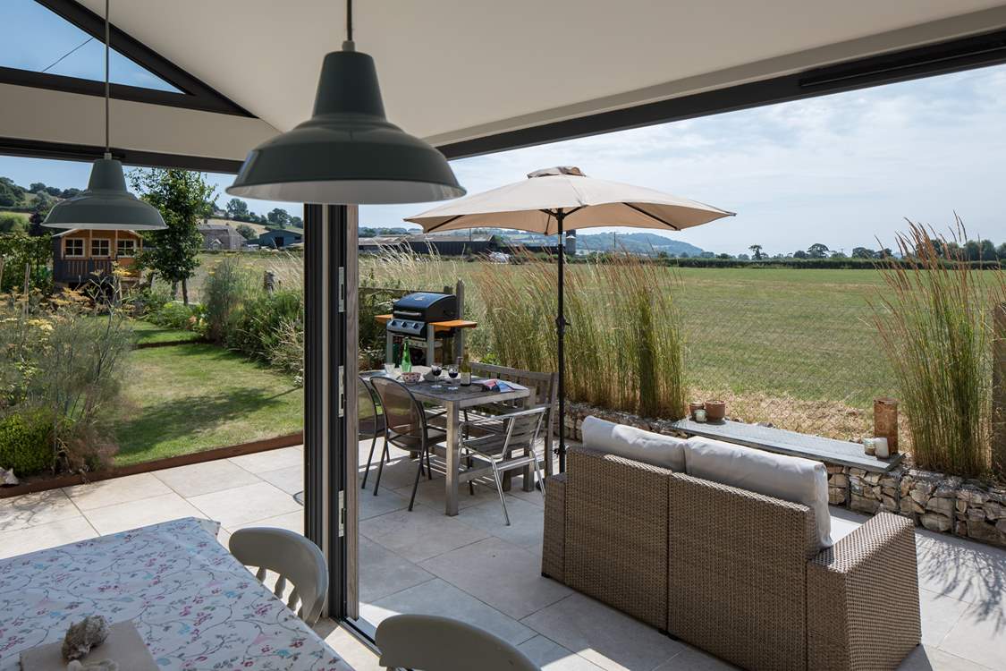 The bi-fold and tri-fold doors open to create a wonderful space.