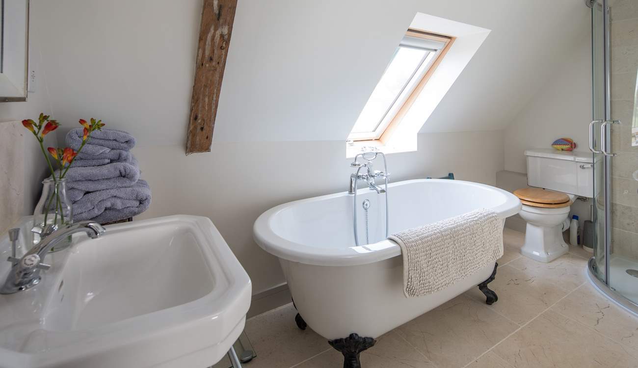 The en suite bathroom for the master bedroom with corner shower cubicle.