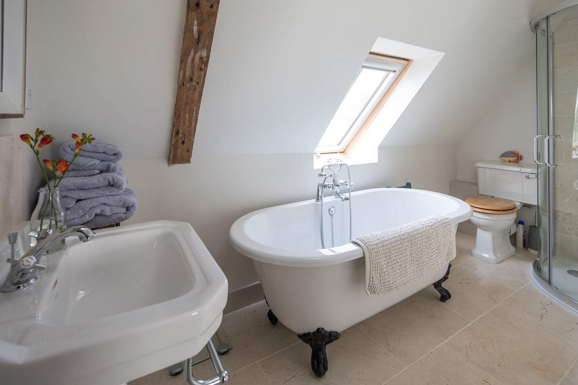 The en suite bathroom for the master bedroom with corner shower cubicle.