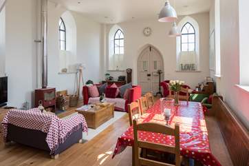 The beautiful sitting-room is flooded with light.